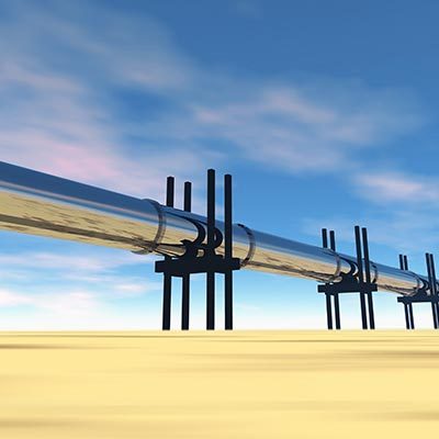 Oil pipeline above ground over desert