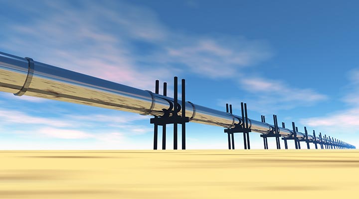 Oil pipeline above ground over desert