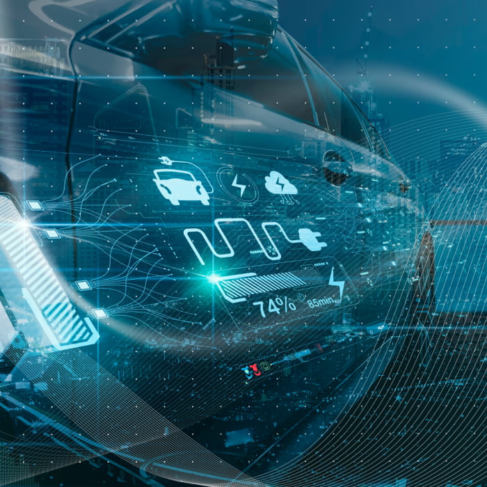 An image of an electric car overlayed with various graphics like battery level and charging icons.