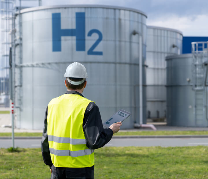 A safety inspector looking at a hydrogen production plant